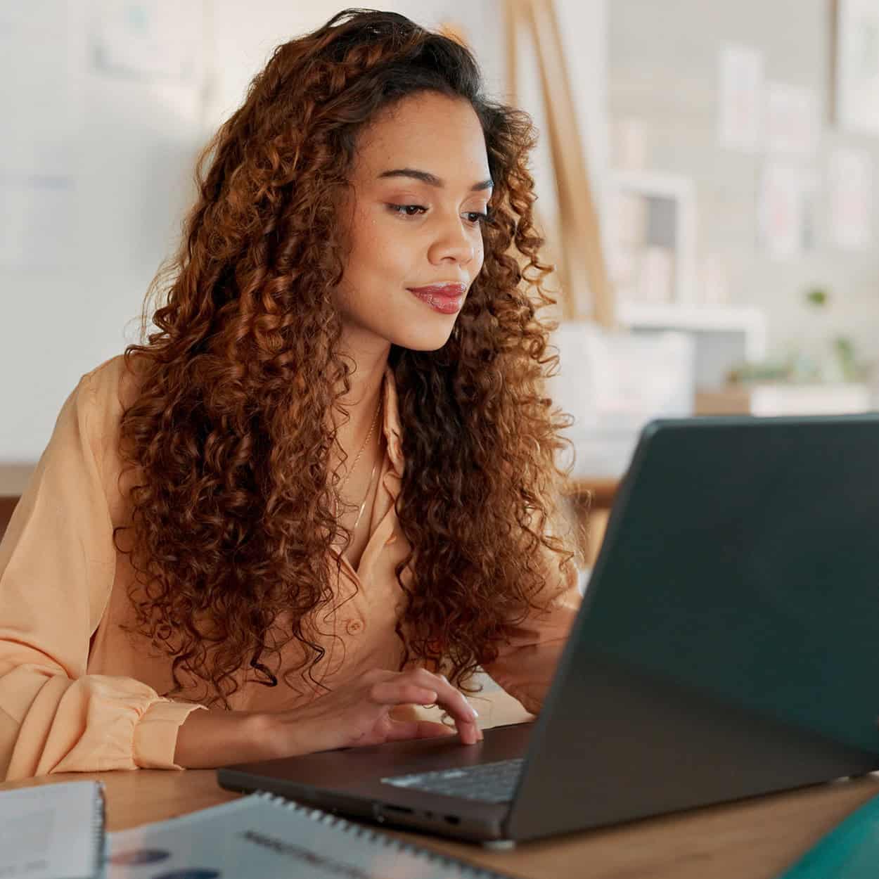 Header Side View Of Woman With Long Hair On Laptop