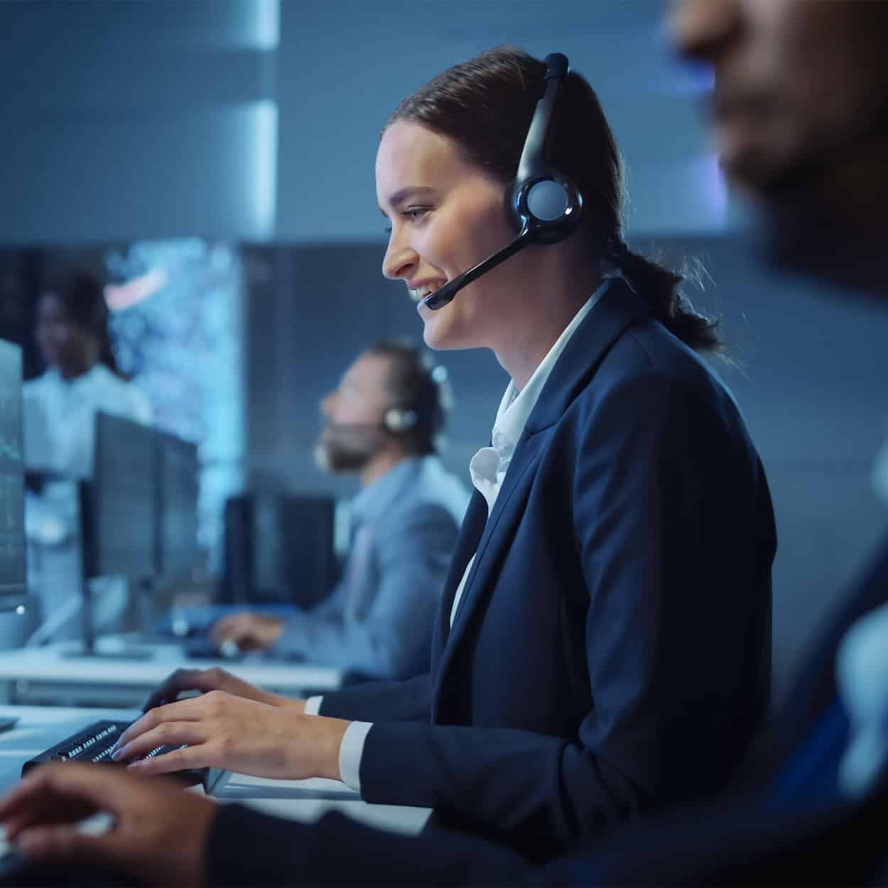 Header Side View Of Smiling Woman With Headset On Computer